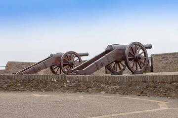 Guns on the wall in Londonderry, Northern Ireland.