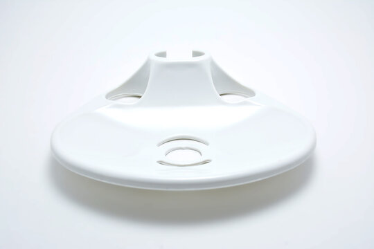 White plastic bathroom soap holder
