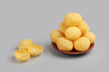 Indian food Home made Pani puri on gray background