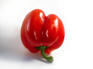 red fresh bell pepper on a white background, close-up