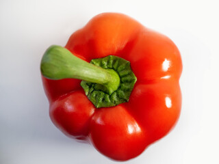 red fresh bell pepper close-up, top view
