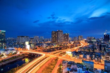 Artwork: Ho Chi Minh city skyline aerial panoramic view at night. 