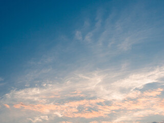 Naklejka na ściany i meble Dramatic sunset. Clouds in wide open sky. Beautiful heaven.