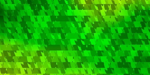 Light Green vector background with triangles.