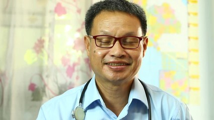 Doctor  giving  counsel  to the patient  by tablet , or tele health  in new normal 