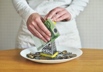 exchange euros for cents using a grater. concept on the theme of money