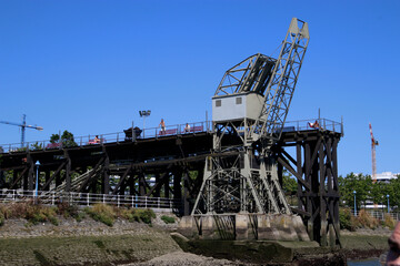 Fototapeta na wymiar Abandoned machinery in the estuary of Bilbao