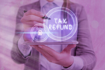 Text sign showing Tax Refund. Business photo showcasing excess payment of paid taxes returned to...
