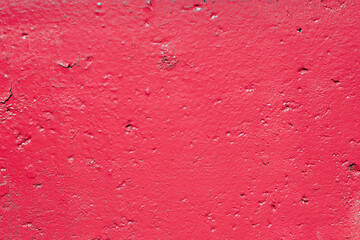 Old wall painted by red paint. Background and texture