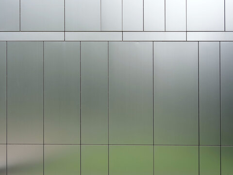 Metallic wall panels of the facade of the building. Aluminum facade panels.