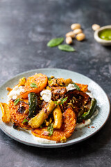 Roast butternut squash and courgettes with feta and yougurt sauce