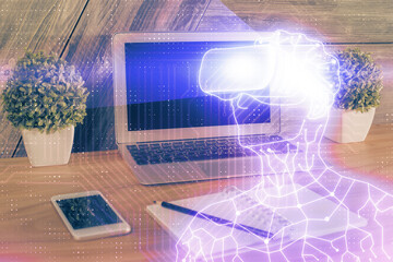 Computer on desktop with AR theme icon. Multi exposure. Concept of augmented reality.