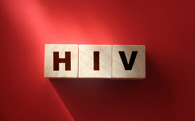 HIV abbreviation on wood cubes. Human Immunodeficite Virus. Healthcare concept