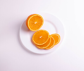 sliced citruses on white 