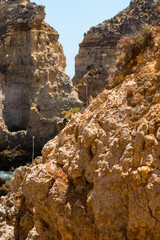 Algarve, Lisbon. Beautiful bay near Lagos town with high cliffs on the shore of the Atlantic Ocean. The Algarve is the southernmost region of continental Portugal. 