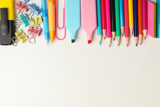 Frame of school supplies on white background, space for text