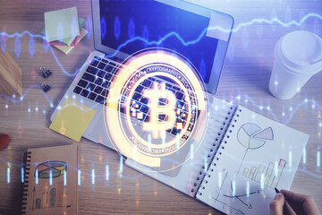 Man's hands working with notes background. Cryptocurrency and finance concept.
