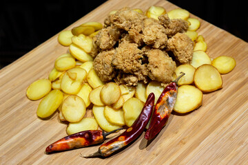 Chicken crispy meat with potatoes