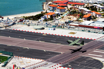 Gibraltar airport runway and La Linea de la Concepcion in Spain, southern Andalucia region, Cadiz...