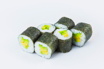 Side view of Vegetarian Japanese Maki Roll with avocado and rice wrapped in nori seaweed. Close-up of asian traditional vegan dish isolated on gray background. Isolation menu image
