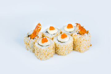 Asian traditional Ebi Tempura Sushi Roll with black tiger shrimp, sesame seeds, Japanese mayonnaise and red caviar on top isolated on gray background. Single object isolation. 
