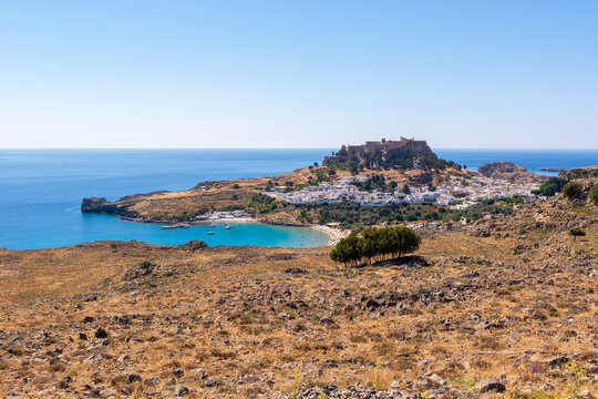 Sea bay and the village of Lindos with the Acropolis on the hill.Rhodes, island, reece