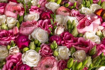 Beautiful colorful gift flower box with different kind of roses closeup photo from above