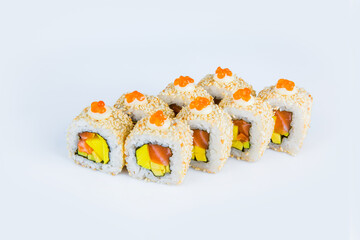 Side view of Asian Sushi with salmon, avocado, Tamagoyaki egg omelette (Tamago), sesame seeds, Japanese mayonnaise and red caviar on top isolated on gray background. Japanese dish menu isolation.
