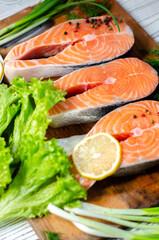 red fish steak with herbs, spices and lemon