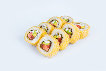 Japanese Roll in tempura isolated on gray background. Asian Hot Roll pieces with salmon, avocado, Philadelphia cream cheese and tomatoes. Food menu isolation on gray
