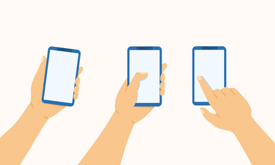 Hand holds the phone, presses and points a finger at a mobile phone