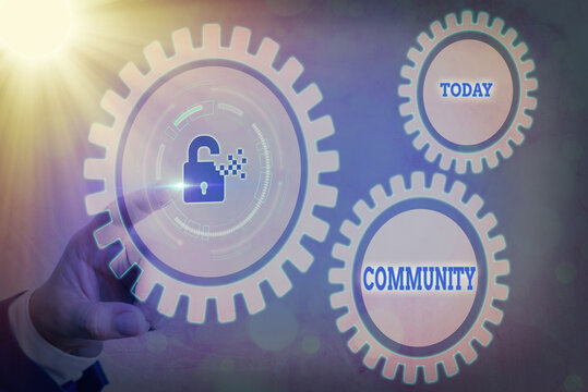Writing note showing Community. Business concept for group of showing with a common characteristics living together Graphics padlock for web data information security application system
