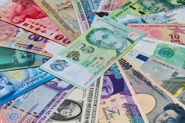 Fototapeta na wymiar Singapore Dollar with other world currencies.