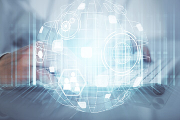 Social network theme hologram with businessman working on computer on background. Multi exposure.
