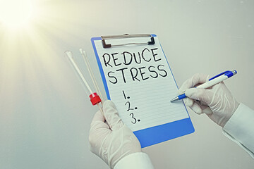 Handwriting text Reduce Stress. Conceptual photo to lessen the state of mental or emotional strain...