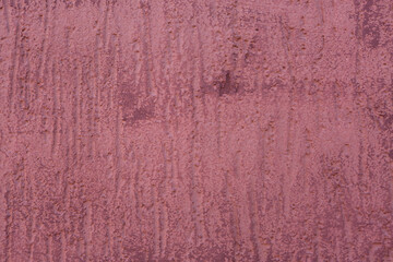 Fragment of a red concrete wall