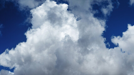 Abstract natural background, sky and puffy clouds,
