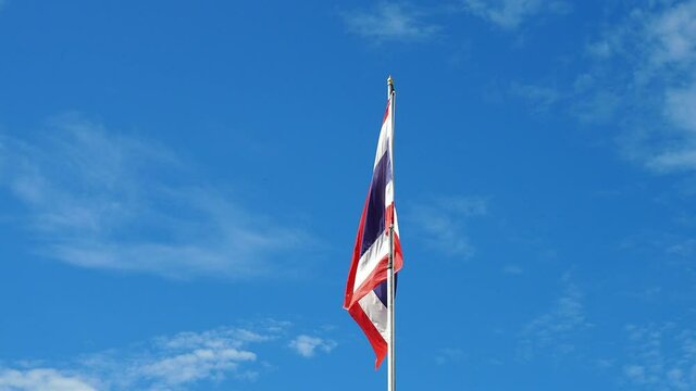 The national flag of Thailand is waving in the wind nature and sky background