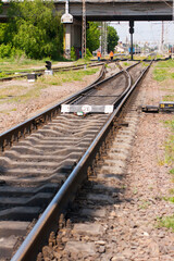 Obraz premium railway rails under the bridge