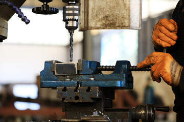 Traditional vertical metal milling machine. In the vertical mill the spindle axis is vertically...