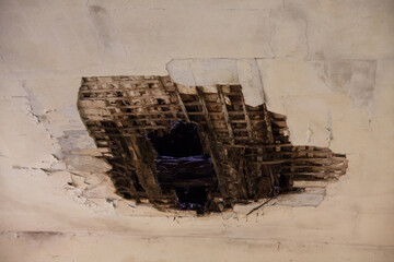 Destroyed ceiling in abandoned apartment in Chernobyl