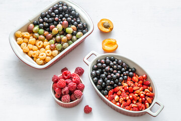 Composition with a variety of fresh berries and fruits