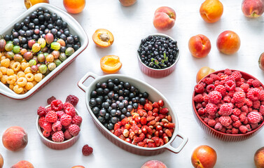 Composition with a variety of fresh berries and fruits