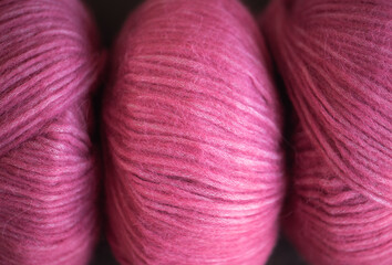 Soft beautiful purple yarn close-up. Knitting threads.
