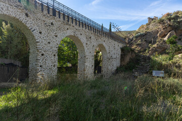 Fototapeta na wymiar Roman aqueduct restored and built in stone