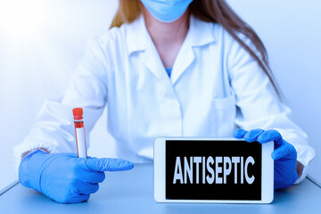 Writing note showing Antiseptic. Business concept for antimicrobial agents that delays or...