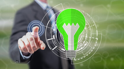 Man touching a green energy concept