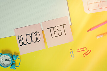 Handwriting text Blood Test. Conceptual photo Extracted blood sample from an organism to perfom a...