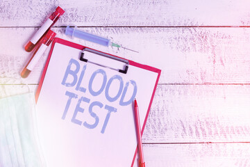 Text sign showing Blood Test. Business photo showcasing Extracted blood sample from an organism to...