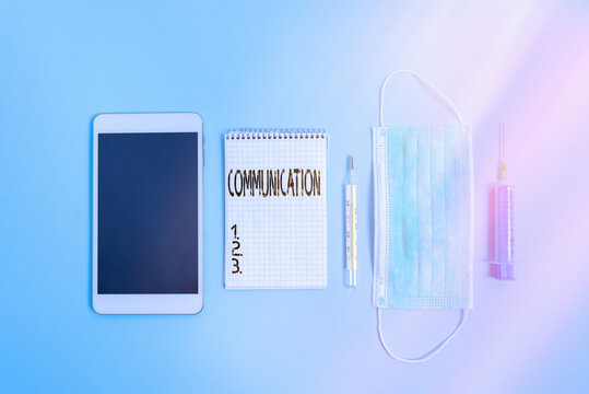Writing note showing Communication. Business concept for a system whereby information is exchanged between individuals Set of medical equipment with notepad for health condition assessment